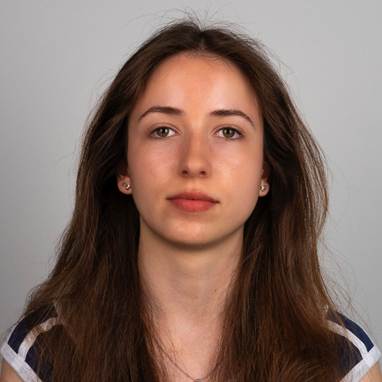 A person with long brown hair

AI-generated content may be incorrect.